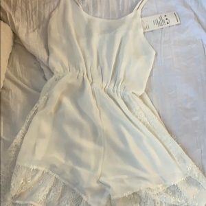 White romper with lace
